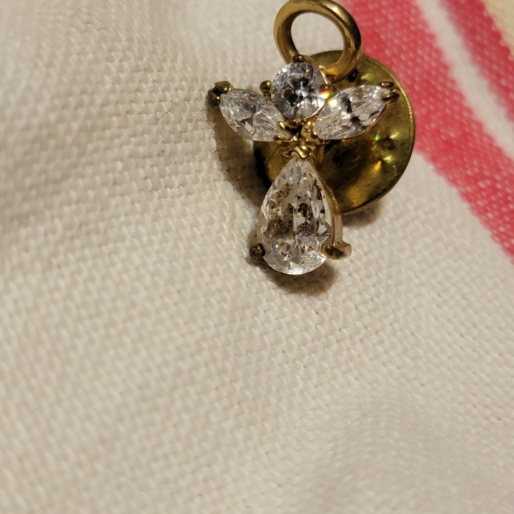 Small angel pin.